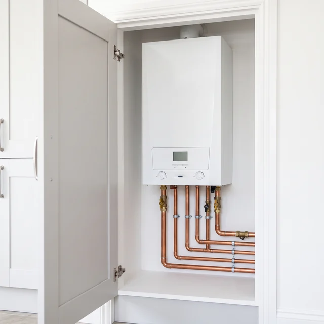 New combi boiler fitted in a utility cupboard, Pannal